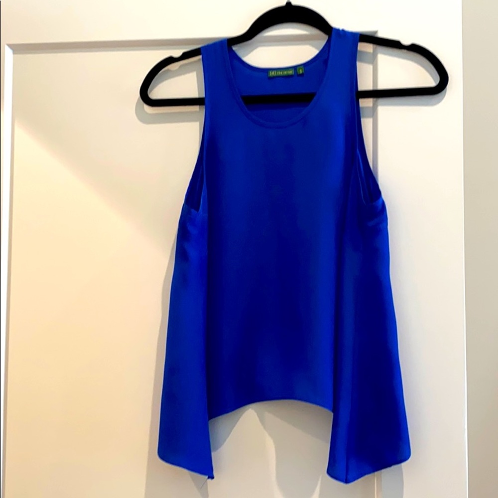 {tl} the letter (S) silk cerulean blue blouse
